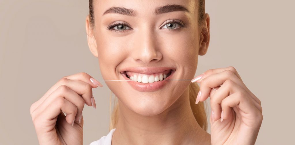 Should You Floss Before or After Brushing?