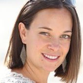 A smiling woman showing her perfect teeth